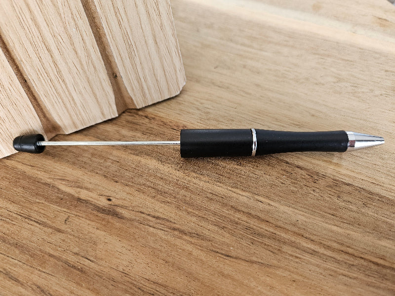 Beadable plastic pen with black ink, color black